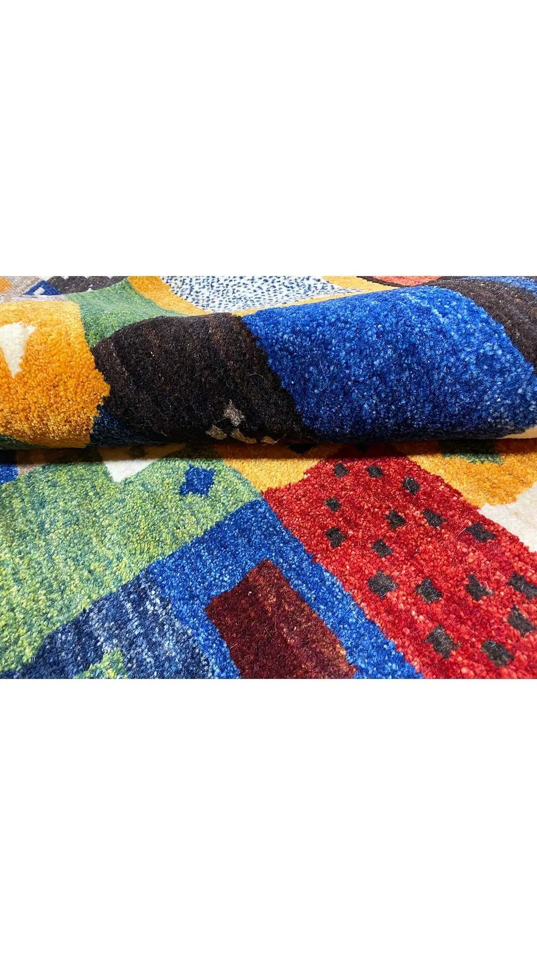 Gabbeh rug 194x140 cm, rolled edge: blue-yellow and black patchwork sections