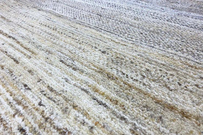 Gabbeh rug with a light beige and gray pattern, fine woven texture in the pile
