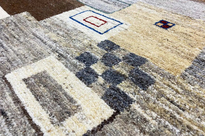 Gabbeh rug 186x150 cm, detail with geometric squares in beige, gray, and blue