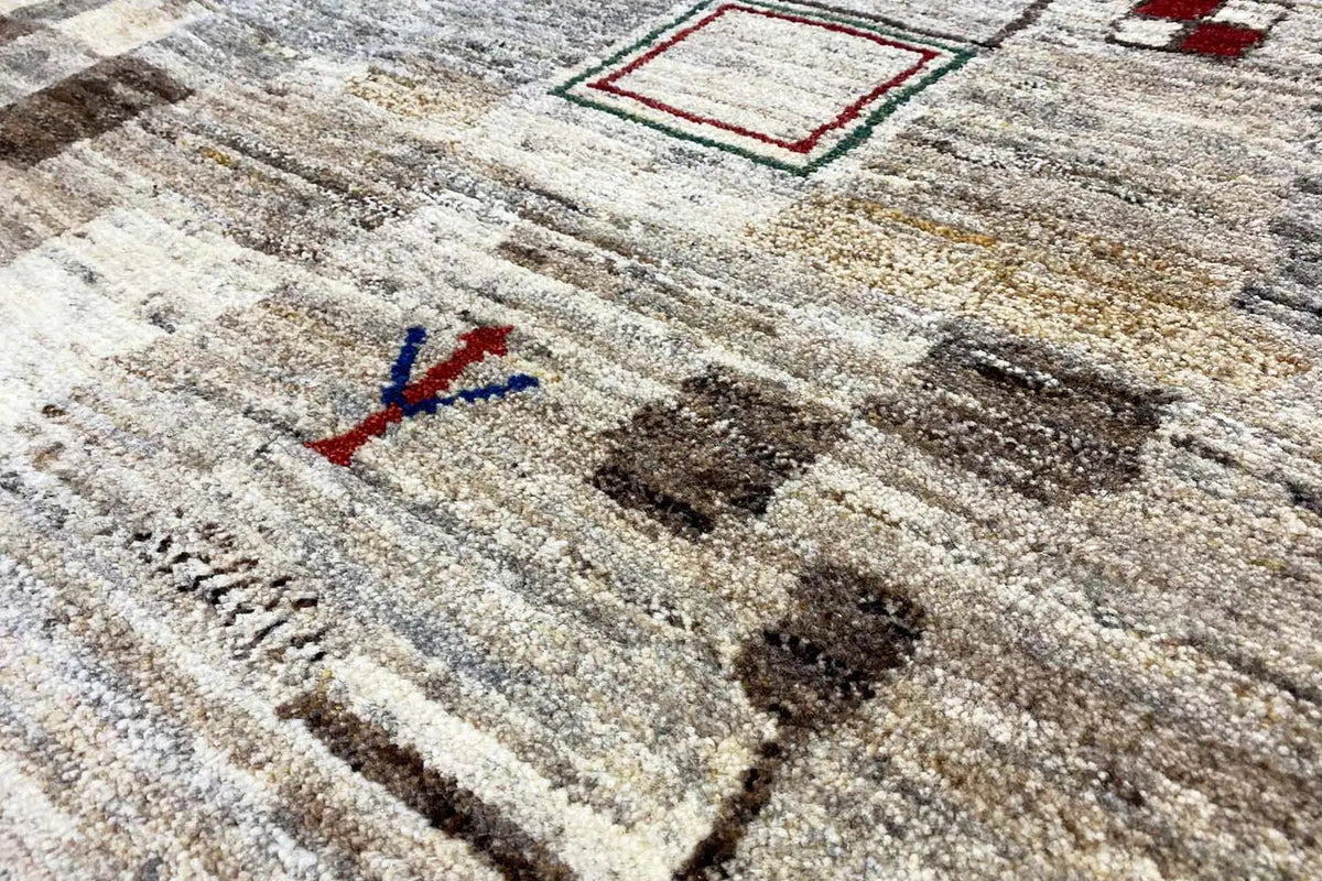 Gabbeh rug in beige-gray with multicolored geometric ornaments