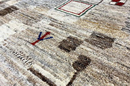 Gabbeh rug in beige-gray with multicolored geometric ornaments