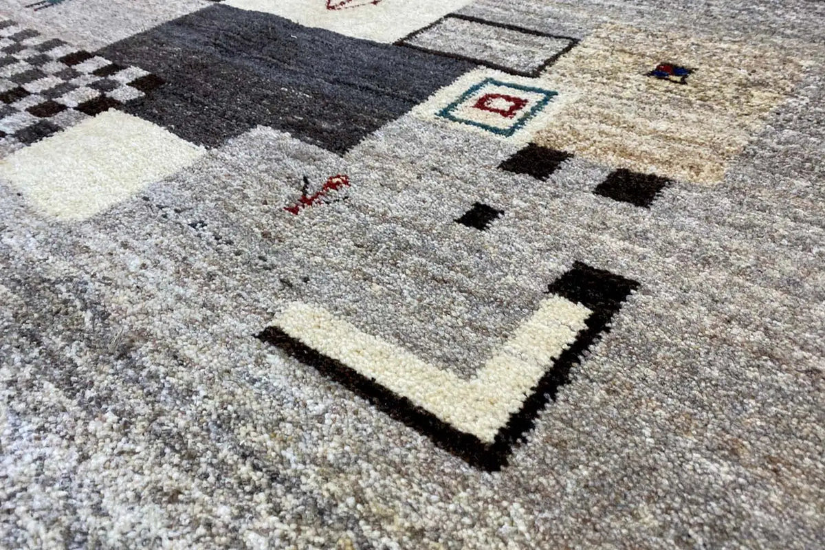 Gabbeh rug 198x148 cm with a geometric patchwork pattern in gray/cream