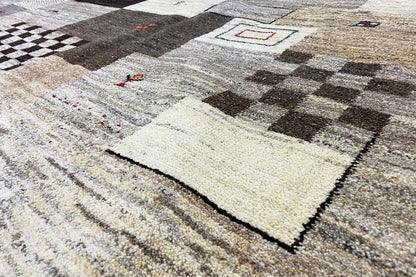 Gabbeh rug with geometric patterns in gray, beige, and black