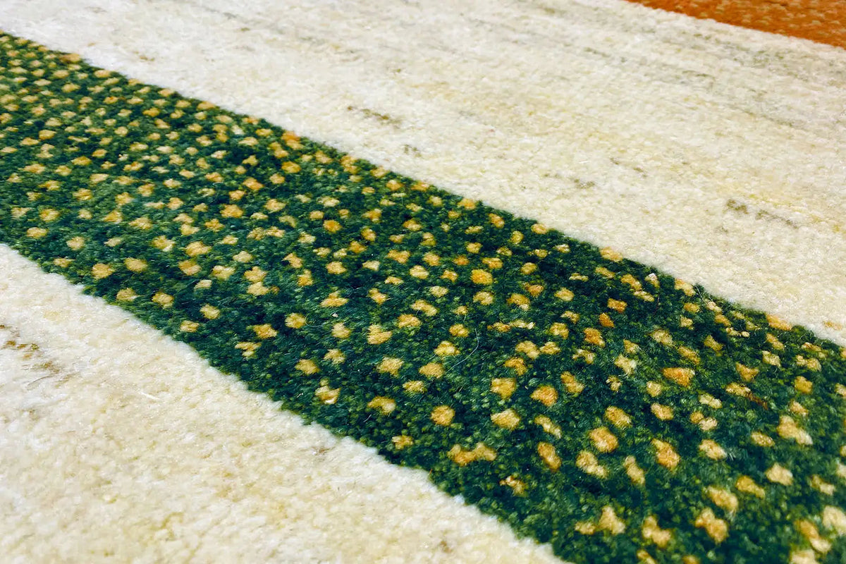 Gabbeh rug: dark green stripe with a fine pattern on a beige background