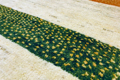 Gabbeh rug: dark green stripe with a fine pattern on a beige background
