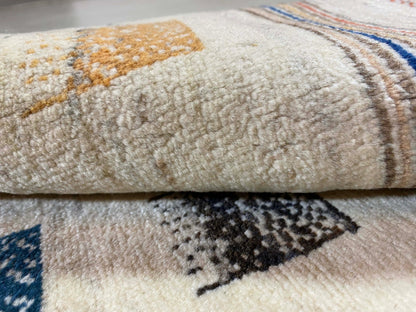 Gabbeh rug with beige pile and multicolored geometric rectangles, detailed stitching