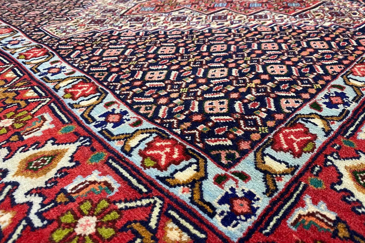 Rug with a geometric pattern in red, blue, and white