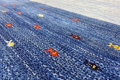 Blue Lori Gabbeh rug with colorful dot motifs, 193x150 cm