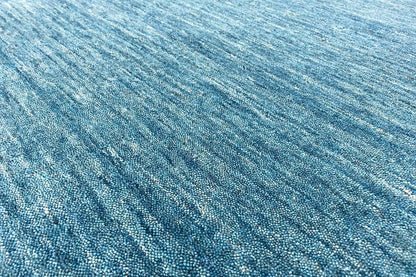 Blue Gabbeh rug with a fine, irregular weave structure