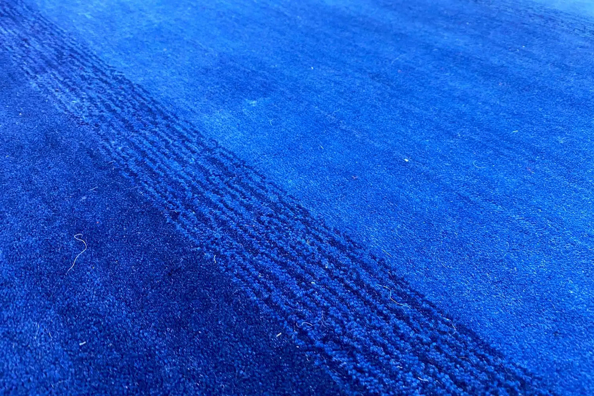 Gabbeh rug 204x149 cm, deep blue pile with diagonal textured stripes
