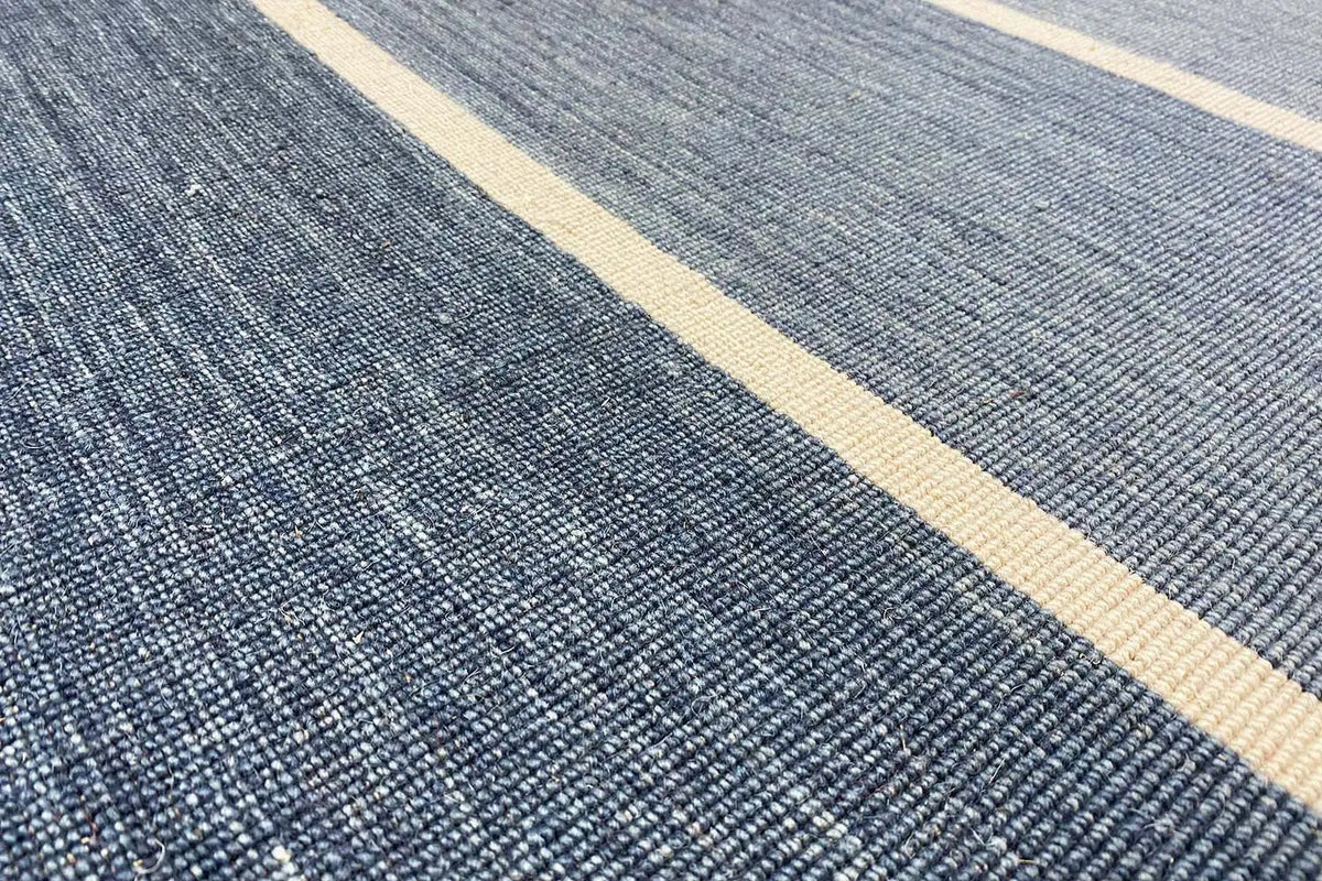 Blue striped kilim with a beige border, detail of the weave structure