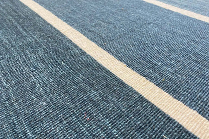Close-up: kilim weave with a fine texture and light beige stripes