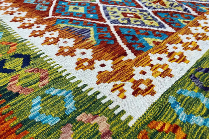 Kilim rug, close-up of the colorful geometric pattern and border trim