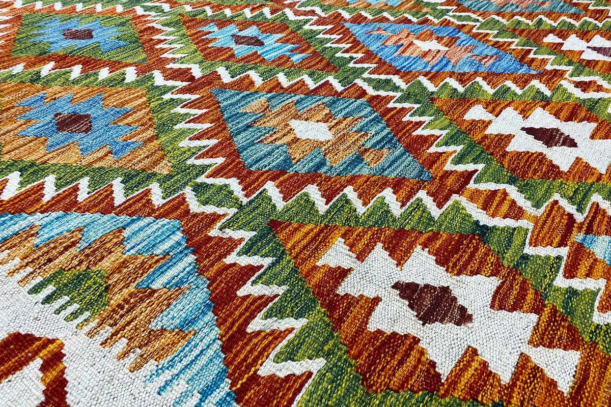 Kilim rug with a colorful geometric pattern, close-up of the weave