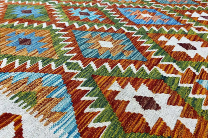 Kilim rug with a colorful geometric pattern, close-up of the weave