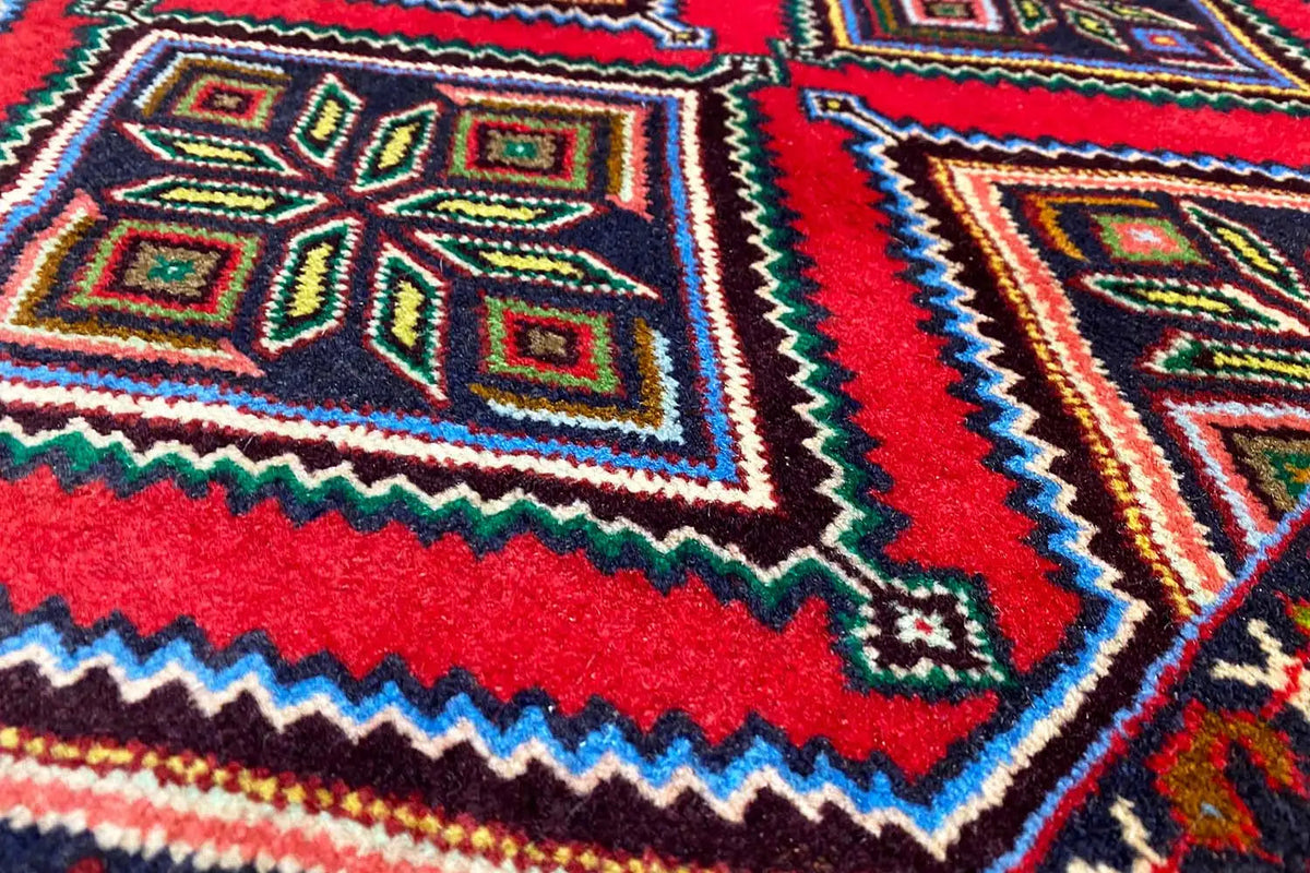 Woven rug with a geometric pattern, multicolored, zigzag edge