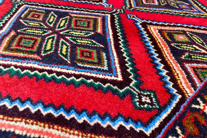 Woven rug with a geometric pattern, multicolored, zigzag edge