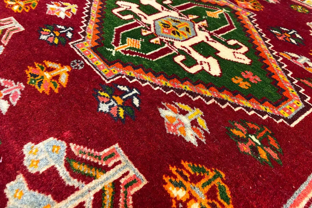 Qashqai Poshti rug 62x57 cm: red pile with colorful ornaments in detail