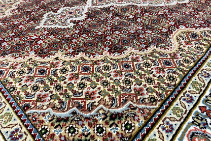 Indo Tabriz rug (185x125 cm) with a richly detailed multicolored pattern