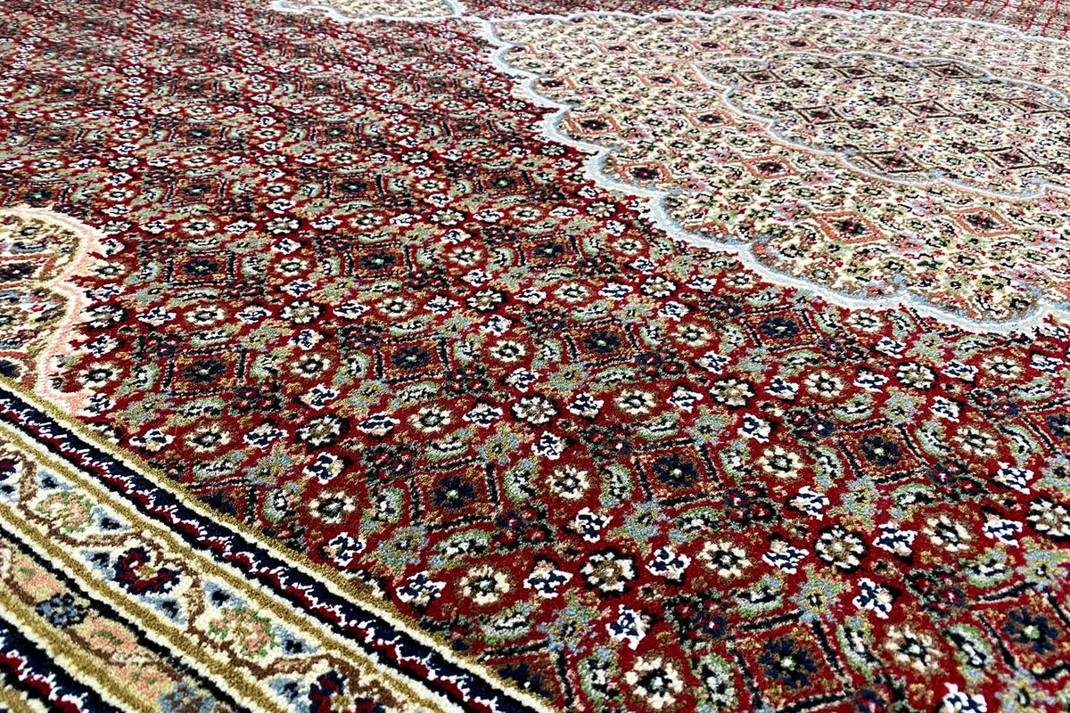 Indo Tabriz rug, red pattern with floral ornaments, close-up