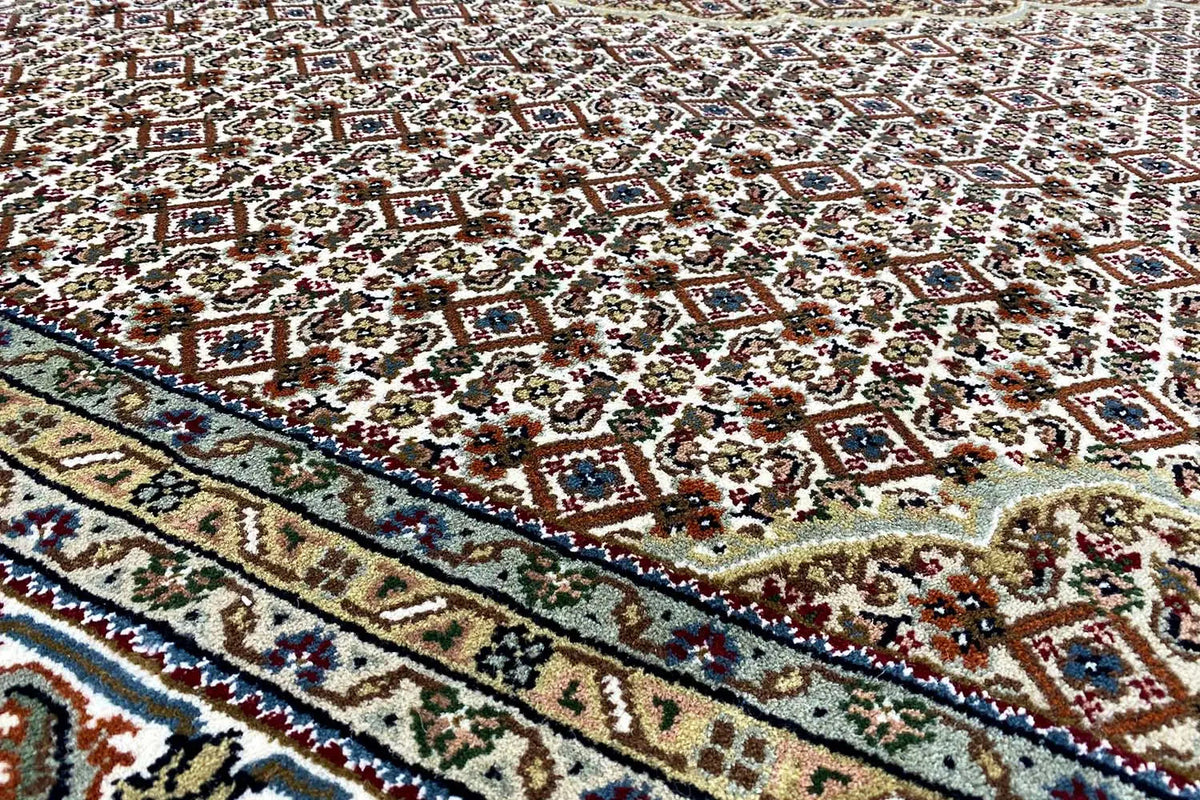 Indo Tabriz rug with ornamental pattern and border, beige with dark blue, red, and green