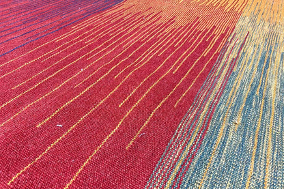 Kilim rug with red, yellow, and blue stripes, densely woven surface