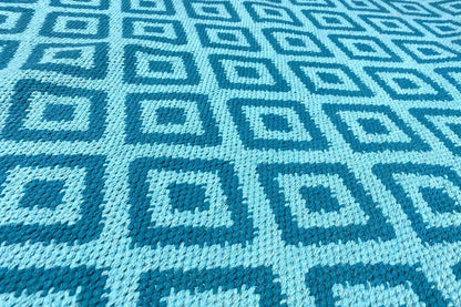 Blue kilim with a square diamond pattern and contrasting light blue lines