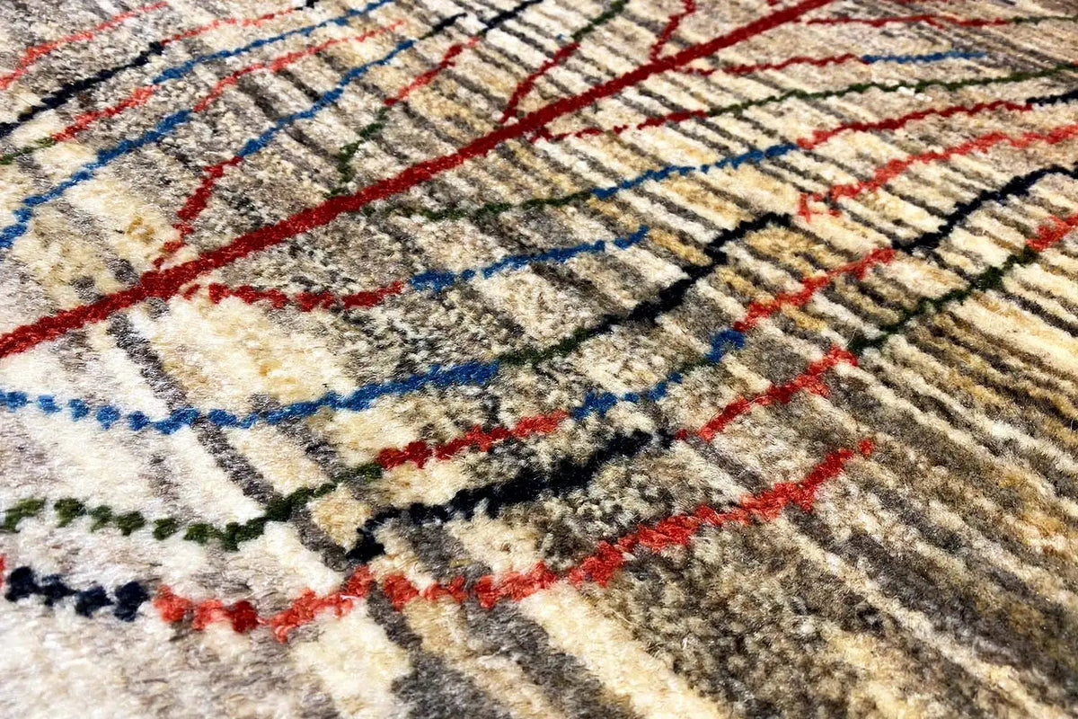 Gabbeh rug with tree motif: beige pile, red & blue lines