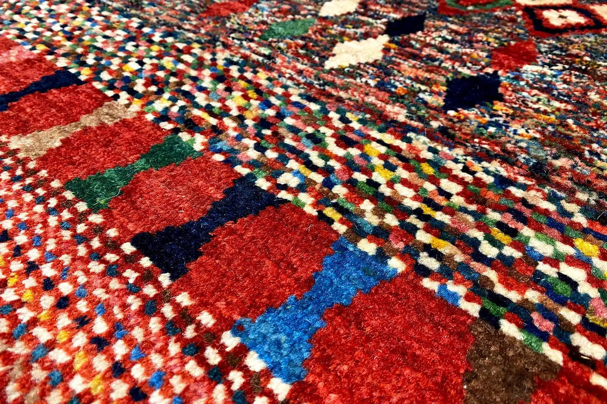 Gabbeh Lori rug with diamond patterns in red, blue, and beige, 142x80 cm