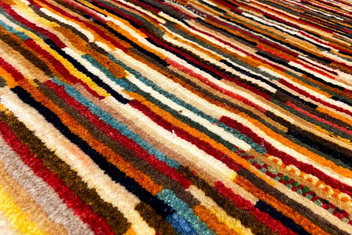 Gabbeh-Lori rug: multicolored stripes, dense pile texture, detail