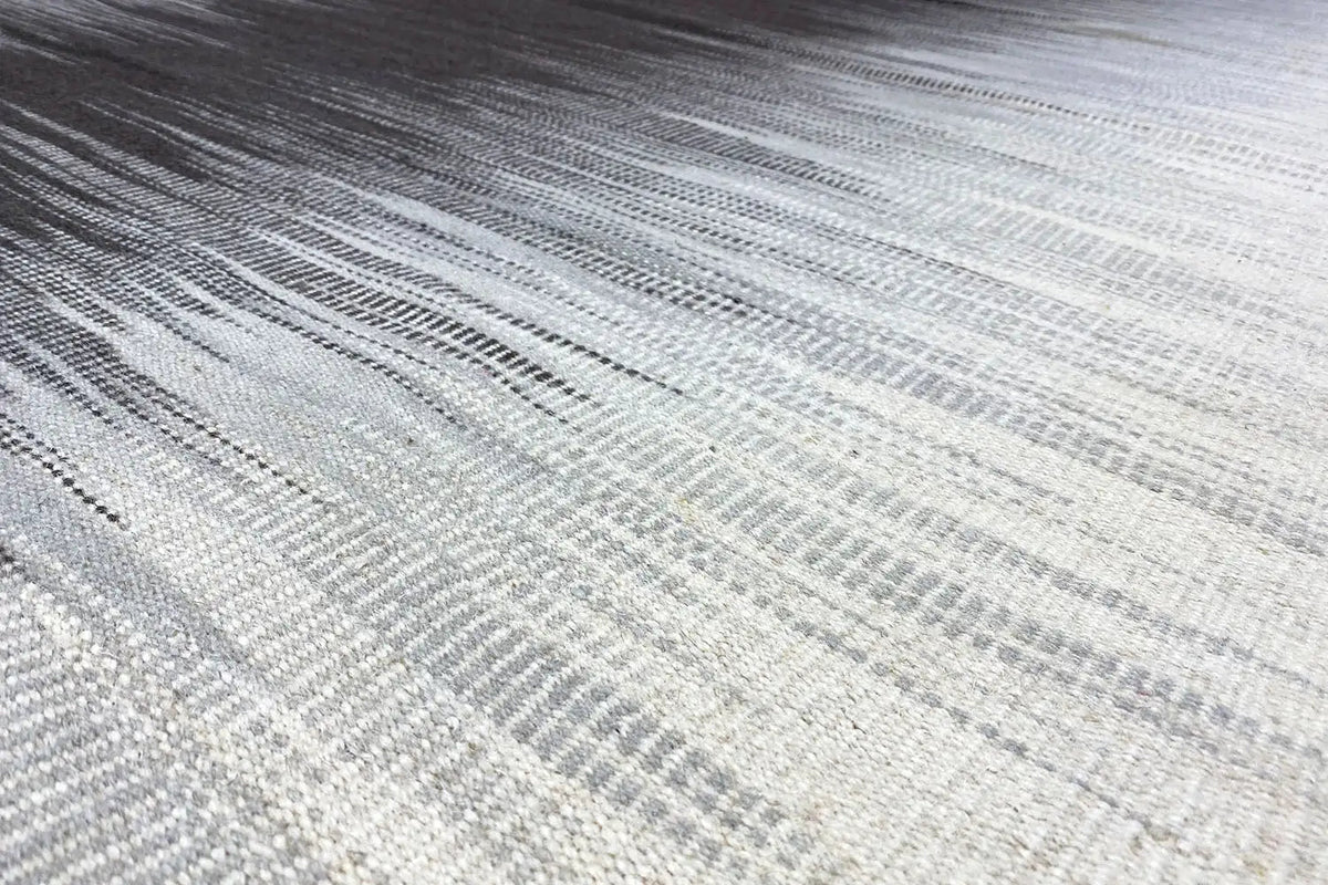 Gray-white kilim rug with fine stripes and contrasting threads