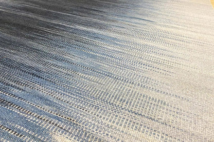 Blue kilim dhurrie rug with fine stripes and a compact weave, detail view