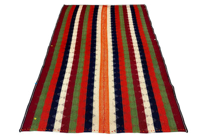 Jajim rug viewed from above at an angle; multicolored vertical stripes, hemmed edge.