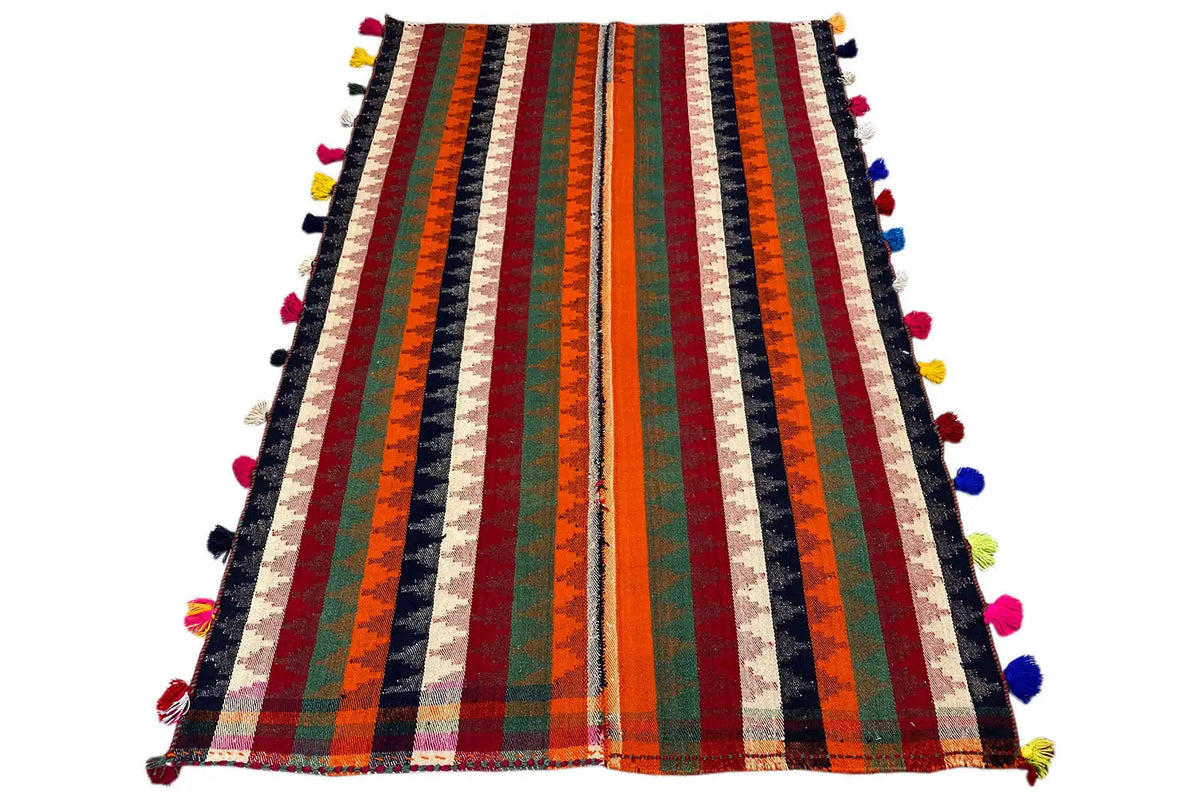Jajim rug: vertical stripes in orange, green, red, and blue with colorful tassels.