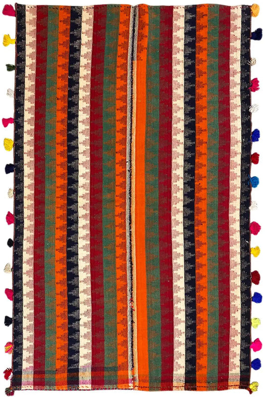 Rectangular Jajim rug with vertical stripes and colorful tassels at all four corners.