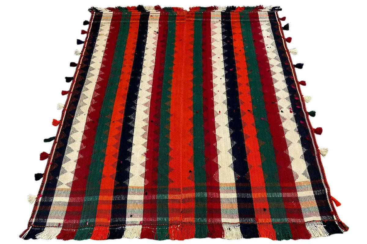Jajim rug with a vertical striped pattern in red, green, blue, and cream, with tassels along the edge.