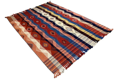 Jajim exclusive rug in diagonal view with diamond ornaments and fringes