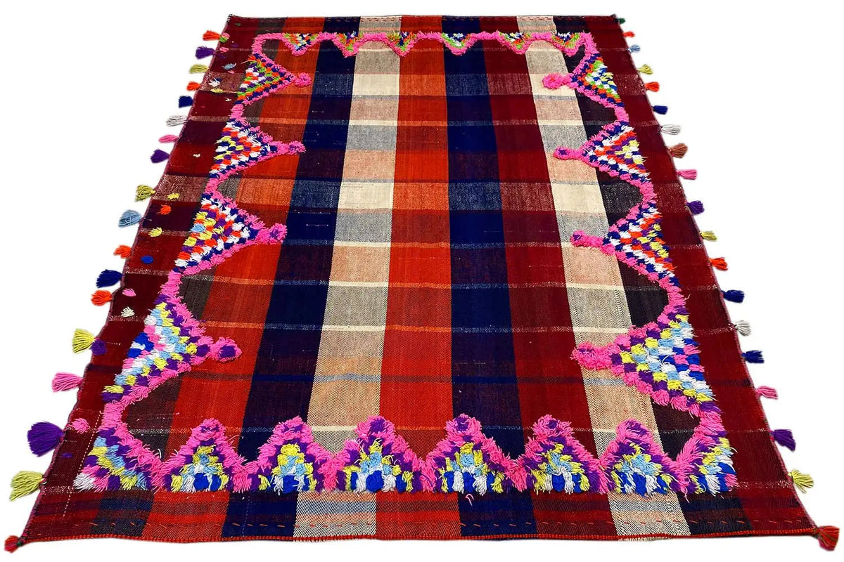 Colorful Jajim rug with stripes and diamond patterns, finished with colorful tassels