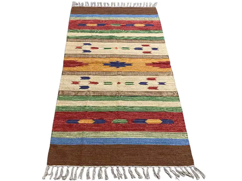 Beige kilim with colorful stripes and star/diamond motifs, fringes