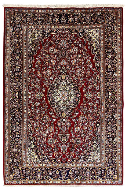 Keshan rug with a red central medallion, dark border, and decorative vines, flat-weave