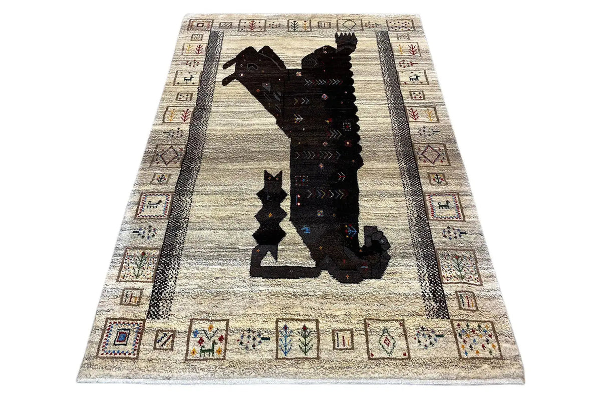 Gabbeh rug with a lion motif, black border, and geometric edging