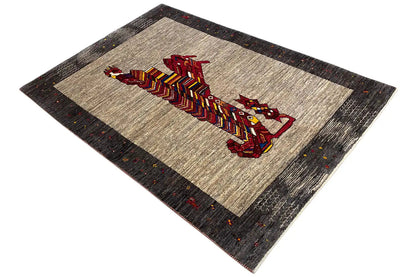 Gabbeh rug with seated lion, beige background, dark border, colorful patterns