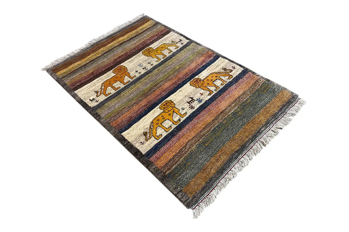 Gabbeh rug oriented diagonally: colorful stripes with lion bands and fringes