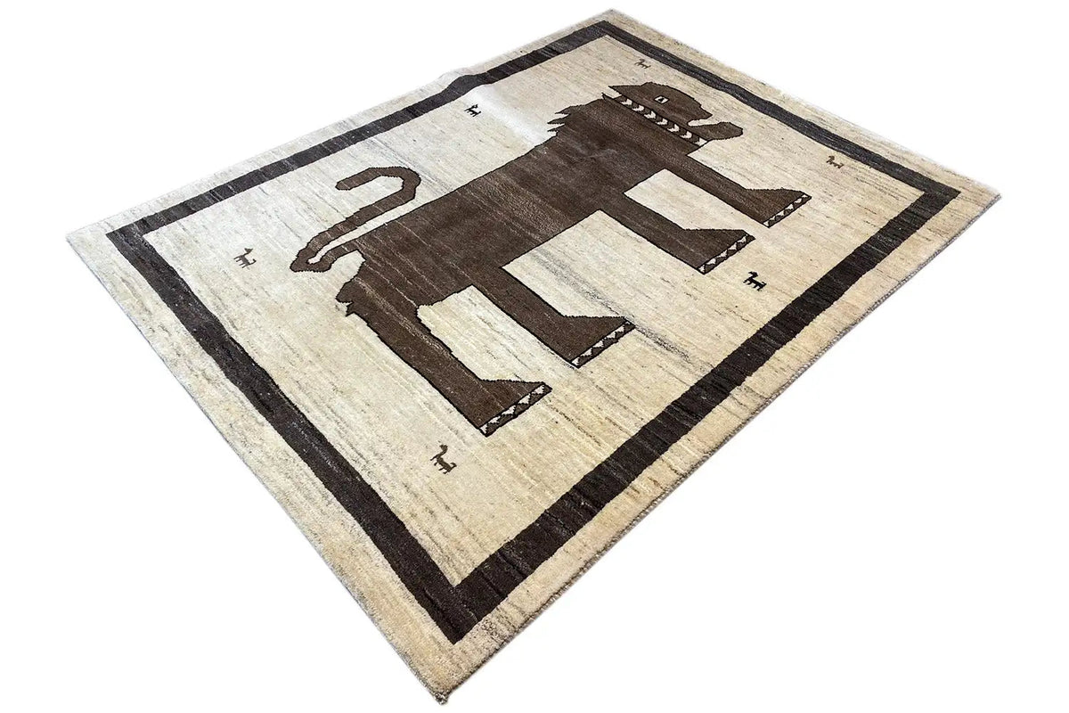 Gabbeh rug in a diamond layout, central animal motif with appendages, light beige and dark brown