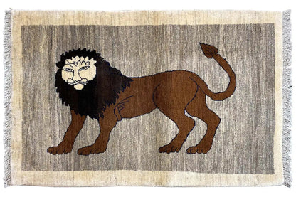 Gabbeh rug with lion motif fully visible; brown lion in rectangular image area