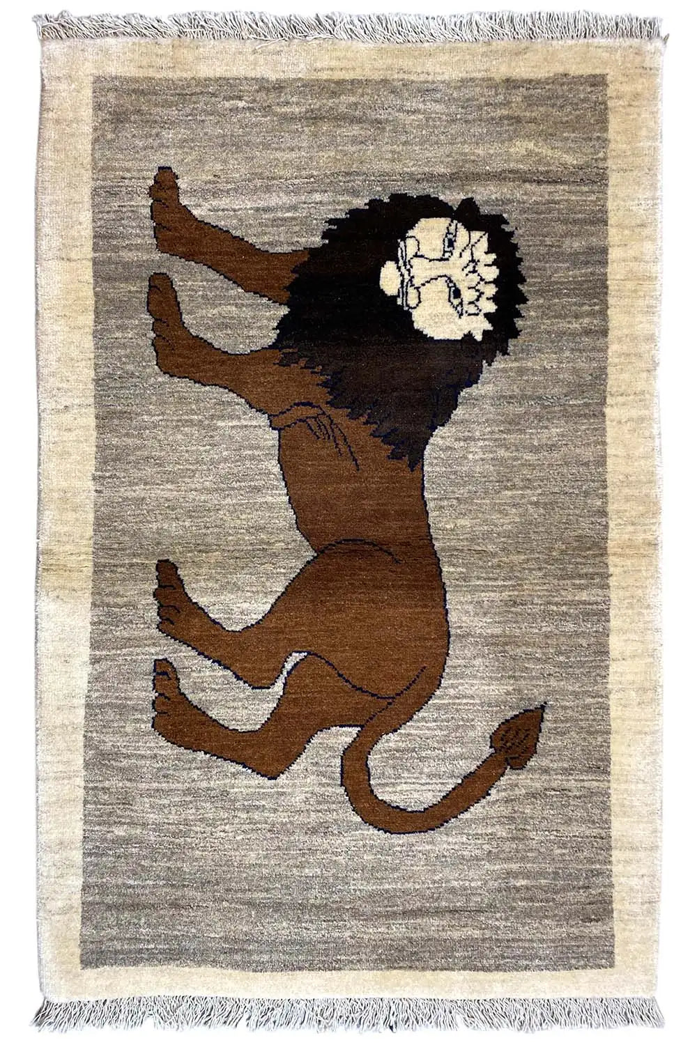 Gabbeh rug with a lion motif in a gradient; black lion's head and brown body պատկեր