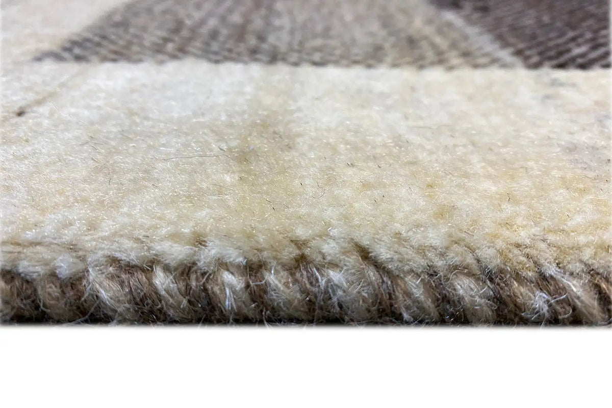 Gabbeh rug with a dense pile and short fringes along the edge