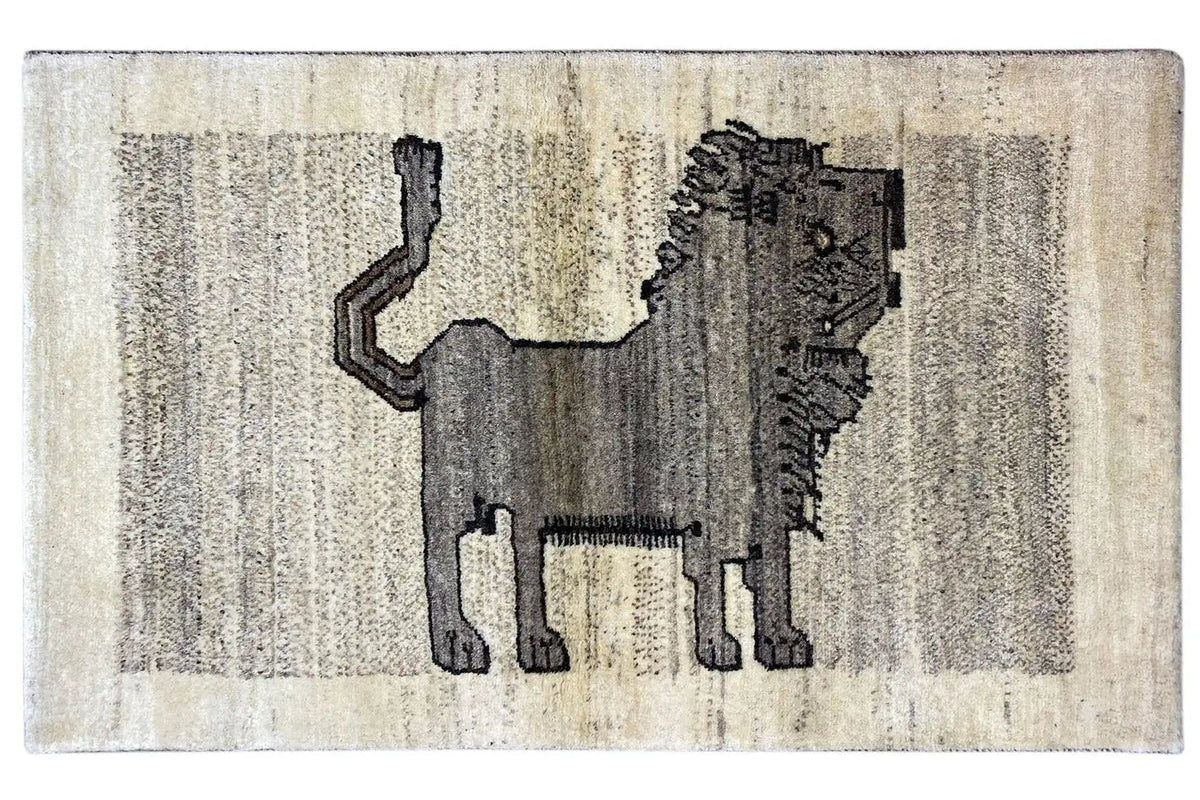 Gabbeh rug with lion's head motif, light beige field, drawn in dark gray