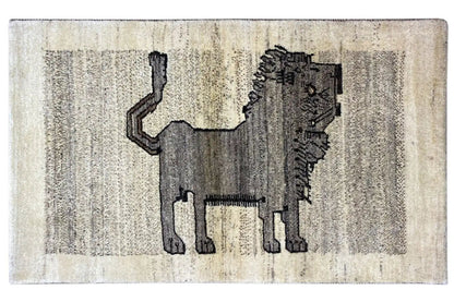 Gabbeh rug with lion's head motif, light beige field, drawn in dark gray