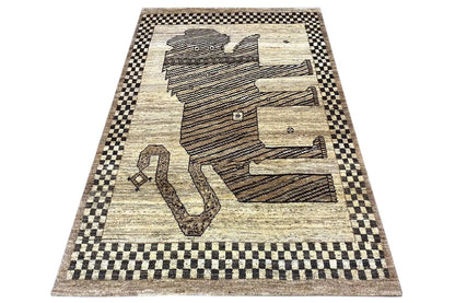 Gabbeh rug with stylized animal and object motif, checked border in black and beige